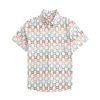 Nouvelle Mode Soie Chemise Hawaïenne Chemise Homme Chemises De Plage Hommes Designer Bowling Chemise Chemises Décontractées Hommes D'été Blouse À Manches Courtes Lâche Robe Chemise M-3XL