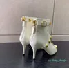 Zarif kış kadın metal düğmesi dekorasyon ayak bileği botları sivri uçlu seksi bot yüksek topuklu siyah topuk fermuar deri bayan ganimet lüks tasarımcı 02 ayakkabı