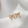 Dos Boucles D'oreilles Style Coréen Élégant Imitation Perles Arc Clip Sur Femme Simple Doux Petit Papillon Pas D'oreilles Trou