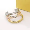 Nueva Moda Europa América Marca Joyería Dama Mujer Acero inoxidable Ahueca Hacia Fuera Grabado Letra 18K Oro Doble Color Brazalete Pulsera Regalos FB1 --07