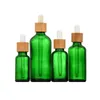 Frostat gr￶nt glas droppflaska 5 ml 10 ml 15 ml 20 lm 30 ml 50 ml 100 ml med bambu lock 1 oz tr￤ eteriska oljeflaskor