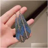 Ciondola i gioielli di moda del lampadario Dazzling Colorf Blue Feather Zircon Grab Chain Long Nappa Orecchini pendenti geometrici esagerati Dhf7V