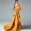2023 Kvadrathalsad Overkjol Sjöjungfru Aftonklänningar Orange Satin Veck Rygglös Stor rosett Kändidklänning Pärlor Vestido De Novia Gala