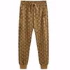 Herenbroeken Heren Merkontwerper Pant mode Mode KLASSIEVE BROWS CASUAL BROEK SPORTSPANT SPORTSPANTEN Full Body Print