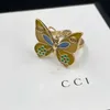 Carta da marca de designer Ring Ring Men's Momen's 2-Color Butterfly 18K Gold Bated embalado a￧o inoxid￡vel amor j￳ias de casamento