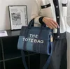 Kvinna duk handväska casual messenger axel kvinnor tote väska svart blå stor kapacitet lyx sammanfogar shopping bag235f
