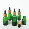 Garrafa de gotas de gotas de vidro verde fosco 5ml 10ml 15ml 20lm 30ml 50ml 100ml com tampa de bambu Tampa 1oz de madeira garrafas de óleo essencial