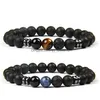 Perline di pietra naturale Perline Uomo Donna Bracciali Portafortuna Nero opaco Lava Ematite Occhio di tigre Corda elastica Gioielli Gif Drop Delivery Dhrpx