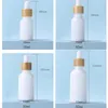 Opal White Glass Bottle 15ml 30ml 50ml with Bamboo Dropper 1OZ Wooden Refillable Essential Oil Bottles Porcelain