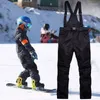 스키 팬츠 남성 스노우 스키 조절 가능한 턱받이 바람 방수 절연 전반적인 방수 겨울 바지면 줄 늘어
