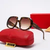 Designer de carrinho de moda Cool óculos de sol novo para mulheres de óculos de sol laranja Modelos de cooperação da marca