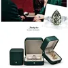 Smycken påsar oirvljus lyxig mörkgrön silkeslen läder bröllopslåda halsband armband presentarrangörsfack