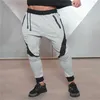 Pantaloni da uomo Pantaloni sportivi da uomo Pantaloni sportivi da fitness in cotone Pantaloni da corsa Pantaloni da jogging Uomo Quick Dry Patch Pantaloni sportivi da palestra Pantaloni da allenamento Pantaloni da jogging Uomo T221205