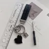 Altos anillos de llave de Qaulity Letras cl￡sicas Black White Silver Hebla de hebillas Dise￱adores Marca Fahsion Fahsion Unisex Key Chains Keyrings