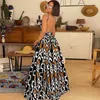 Festklänningar kvinnors tryckta hängslen backless sexig lång kjol sommar ärmlös bohemisk stil strappy klänning mode sväng sundress 221203