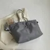 デザイナーブランドショッピングバッグ女性トライアングルラベル防水レジャー旅行バッグ大容量ナイロンママトートレディースショルダーバッグ