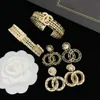 Ohrringe und Armbänder echtes Leder mit Gold plattiert Cutout Mode Set Frauen Designer Perlenohrringarmband Hochzeitsgeschenk Schmuck Braut mit Kasten und Stempel