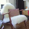 Mattor Hemtextilmatta mjuk fårskinnstol täcker varm hårig sittplats vanlig hud päls fluffig vit sovrum faux matta