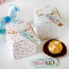 Present Wrap 10sets söt nappflaska papper godisbox bule rosa dot fest gynnar barn baby shower födelsedagsdekoration med tagg