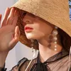 Kolczyki Dangle Trend Perła długa kobieca gwiazda księżyca kwiat krążkowy wisiorek ślubny moda koreańska biżuteria 2022