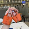 Echtes Leder Mini Gemüse Korb Handtasche Anhänger Kreative Kopfhörer Tasche Ornamente Nette Eimer Tasche Schlüsselbund Großhandel