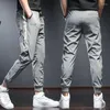 Pantalons pour hommes hommes hommes 2023 été Sport Jogging décontracté Streetwear mode côté rayure cordon blanc Joggers pantalon