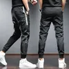 Pantalons pour hommes hommes hommes 2023 été Sport Jogging décontracté Streetwear mode côté rayure cordon blanc Joggers pantalon