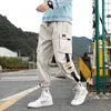 Männer Hosen Streetwear Casual Hosen Männer Bänder Harem Jogging Slim Fit Frühling Cargo Multi-Taschen Wo Hosen Jogger T221205