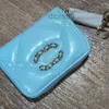 Skórzana torba kanału Mała torebka portfel Europa i Ameryka moda damska męska zero portfela nowa prosta wszechstronna mini -mini -łańcuchowa torba na kartę łańcuchową