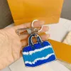 M69292 Signature Escale Speed ​​Key Holder Bag Charm Keychain Car Key Ring Chain Bell Naam ID Bag Tag Stamp Stempel Pouch Cles 207T