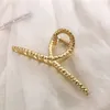 Nuove donne Eleganti capelli in metallo d'oro artigliate clip geometriche cavi geometriche Accessori per capelli alla moda vintage