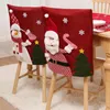 Couvre-chaise Noel Père Noël Noël Non-tissé Table de dîner Chapeau rouge Décorations de Noël pour la maison Année 2023