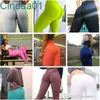 Kvinnor Yoga Leggins Slim Sexy Hip Push Up Fitness Tights Wholesale High midjeträning Byxor Solida andningsbara byxor