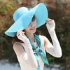 Cappelli a tesa larga HT1681 2022 Stile della Corea delle donne di estate grande fiocco solido grande ripiegabile Floppy Beach Cappello da sole femminile di paglia