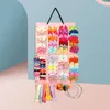 Förvaringslådor Pouch Practical Universal Foldble Baby Bow Pannbandshållare för garderob Hanging Bag Organizer