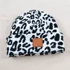 Modebrev stickade hattar vinterhåror unisex leopardko tryckt skalle mössor designer motorhuven trendig etikett virkning hatt stickning beanie hip hop örat muff 12 färger