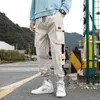 Männer Hosen Streetwear Casual Hosen Männer Bänder Harem Jogging Slim Fit Frühling Cargo Multi-Taschen Wo Hosen Jogger T221205