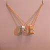 Snake Bone Necklace female 18k Rose Gold European And American Fashion Simplicity White Shell Diamond Inlaid Snake Shaped Pendant Lock