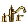 Torneiras de pia do banheiro Manunhão de bronze dourado de luxo de três orifícios Torneira de bacia de alta qualidade da torneira de alta qualidade