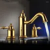 Rubinetti per lavabo da bagno Ottone dorato di lusso Doppia maniglia Rubinetto diffuso a tre fori Rubinetto per lavabo di alta qualità