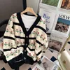 Women s Knits Tees High Quality Flower Jacquard Sweater Cardigan Autumn Winter Oversized Striped Coat Vintage Women Knitted Jackets 221206