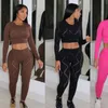 Tracksuits voor dames tweedelige gat ronde nek lange mouw top en broek set pakken 2pcs outfits matching sets