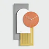 壁の時計洗練されたエレガントな時計クォーツミニマリストカラフルな北欧のモダンなデザインホラロジュのムラレぶら下がっている装飾