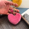 Клапов Прекрасной Сердце в форме сердца Пушистый плюшевый персиковый шарм с кисточкой для женщин для женщин для женщин