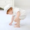 First Communion Robes Baptême Robe Baby Baby White White One-Pice Shorts avec un chapeau deux ensembles MQ9706