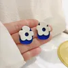 Backs oorbellen retro Koreaanse stijl contrast kleur blauwe bloem kleine hars acryl witte clip geen doorboorde oren oorclip