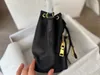 ブランドスクールバッグ2022デザイナーデザイン新しい女性のバケツ大容量キャンバスハンドバッグドローストリングパラシュートクロスメッセンジャーバッグ
