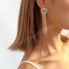 Luxe zilveren kleurstïne -strass kristal lange kwastoor oorbellen voor vrouwen bruids druppel earrings brincos bruiloft sieraden