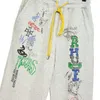 Abbigliamento da uomo Chaopai Rhude High Street Cartoon Graffiti Pantaloni larghi casual per uomo e donna