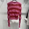 Maglione da donna firmato Cuore a righe rosa scavato Capelli islandesi autunno / inverno Top corto in maglia slim fit